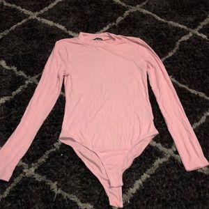 Light pink body suit